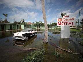 The Sunrise Motel remains flooded after Hurricane Irma hit the area on September 11, 2017 in East Naples, Florida. A Seaforth hydro technician,  along with 17 other people from surrounding hydro companies just returned from a two-week relief effort in Naples to assist in restoring power for hurricane victims. (Postmedia file photo)