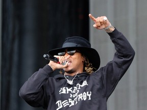 Rapper 'Future', real name Nayvadius DeMun Wilbur, performs during the Governors Ball Music Festival on Randall's Island Park in New York, on June 5, 2015. AFP PHOTO/TREVOR COLLENS (Photo credit should read TREVOR COLLENS/AFP/Getty Images)