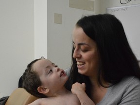 Tiffany Collins, pictured here with two-year-old Nikolas at Timmins and District Hospital, would like to see more nurses trained to use G-tubes. The hospital's chief of pediatrics said nurses received training on Friday, and they'll continue to improve pediatric care.