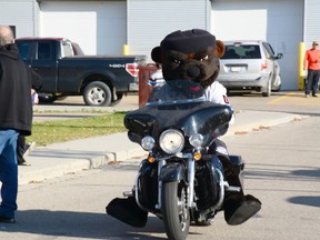 Slash, mascot for the Whitecourt Wolverines, rides a motorcycle outside the Scott Safety Centre on Sept. 15. The Wolverines recently got the support of the Town for a grant application (Peter Shokeir | Whitecourt Star).