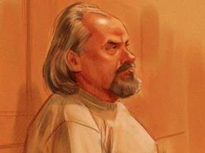 Basil Borutski remained silent as a plea of not guilty was entered on his behalf Monday at the opening of his trial on three counts of first-degree murder. (Greg Banning, Postmedia)