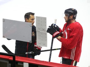 Bobby Ryan of the Ottawa Senators listens to the head coach Guy Boucher after the morning skate at Canadian Tire Centre in Ottawa on Sept. 22, 2017. (Jean Levac/Postmedia)