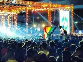 Members of the crowd wave the LGBT rainbow flag at a concert in Cairo, Egypt on September 22, 2017. (Twitter/Rainbow Egypt)