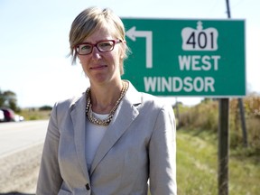 Alysson Storey is pushing for Highway 401 barriers to prevent cross-over crashes like the one on August 29 near Dutton that killed her friend Sarah Payne and Payne's five-year-old daughter. She was photographed beside Kent Bridge Road near McKay's Corners. (DEREK RUTTAN, The London Free Press)