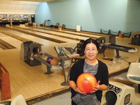 Jean Tang and her husband, Jason Zhang, own Plaza Bowl in Sudbury, Ont. Ten-pin bowling lanes are being installed at the bowling alley. John Lappa/Sudbury Star/Postmedia Network