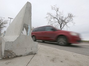 Large concrete blocks have been installed along the road in front of Investor's Group Field, in Winnipeg. Tuesday, October 3, 2017. Chris Procaylo/Winnipeg Sun