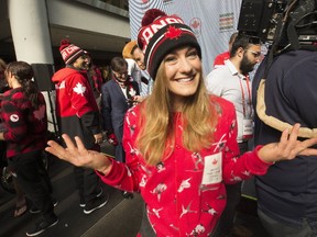 Canadian Ski Jumper Taylor Henrich shows off her pajamas as Hudson's Bay launches Team Canada Collection for PyeongChang 2018 at the Eaton Centre in Toronto on Oct. 3, 2017. (Stan Behal/Toronto Sun/Postmedia Network)