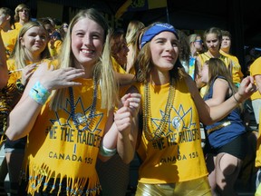 The Delhi Raiders had plenty to cheer about at Young Canada Day Tuesday as they captured their eighth consecutive total points championship at the Norfolk County Fair. Among those whooping it up in the grandstand on behalf of the home team were Alyssa Long, left, and Natalia Innes. MONTE SONNENBERG / SIMCOE REFORMER