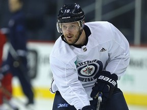 Bryan Little carries the puck during Winnipeg Jets practice at Bell MTS Place in Winnipeg on Oct. 2, 2017. (Kevin King/Winnipeg Sun/Postmedia Network)