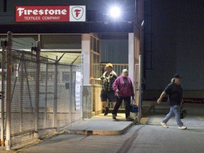 Workers leave Firestone Textiles Company in Woodstock on Wednesday after a morning meeting to announce that the plant will close in 2018. Derek Ruttan/The London Free Press/Postmedia Network