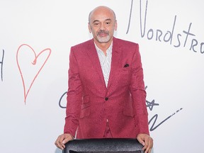 Fashion designer Christian Louboutin poses for a photo during a personal appearance at Nordstrom Downton Seattle on October 17, 2016 in Seattle, Washington. (Photo by Mat Hayward/Getty Images for Nordstrom)