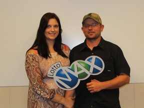 Robin Walker, left, and Brett McCoy, of Yellowhead County, pose for a portrait in this undated handout photo. The couple won a $60 million dollar prize in the Lotto Max draw, the largest lottery prize ever won in Alberta. THE CANADIAN PRESS/HO-Alberta Gaming and Liquor Commission