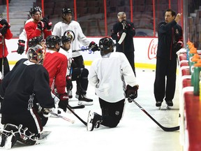 Ottawa Senators coach Guy Boucher during practice in Ottawa on Oct. 2, 2017. (Tony Caldwell/Postmedia)