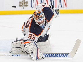 Edmonton Oilers goalie Cam Talbot makes the save against the Carolina Hurricanes during NHL pre-season action in Edmonton on Sept. 25, 2017. (THE CANADIAN PRESS/Jason Franson)