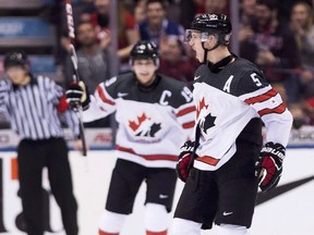 Canada defenceman Thomas Chabot (5) reacts after scoring against team Slovakia during second period IIHF World Junior Championships hockey action in Toronto on Tuesday, December 27, 2016. Chabot was named the best player at the world junior hockey championship. (THE CANADIAN PRESS/Nathan Denette)