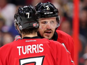 Kyle Turris and Dion Phaneuf confer as the Ottawa Senators take on the Pittsburgh Penguins in Game 4 of the NHL Eastern Conference playoffs at the Canadian Tire Centre on May 4, 2017. (Wayne Cuddington/Postmedia)