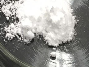 A sample of carfentanil being tested in a U.S. Drug Enforcement Agency la. RUSSELL BAER, AP