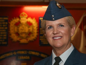 Tim Miller/The Intelligencer
Lieutenant Cynthia Russell stands in front of the The Hastings and Prince Edward Regiment badge at the Belleville Armouries on Wednesday. Russell became the commanding officer of the 608 Duke of Edinburgh Royal Canadian Air Cadet Squadron as part of a change of command ceremony.