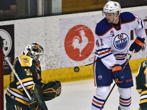 Edmonton Oilers rookie Tomas Soustal (41) watches the rebound off University of Alberta Golden Bears goalie Luke Siemens (30) at Clare Drake Arena in Edmonton Thursday, September 21, 2016. ED KAISER / POSTMEDIA