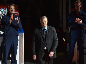 After being hit by a car and stabbed last Saturday night while on duty, EPS Const. Mike Chernyk walks out on the red carpet at the Edmonton Oilers vs Calgary Flames season opener during NHL action at Rogers Place in Edmonton, October 4, 2017. Ed Kaiser/Postmedia