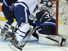 Leafs centre Nazem Kadri puts the puck past Jets goaltender Steve Mason last night at Bell MTS Place. (Kevin King/Winnipeg Sun)