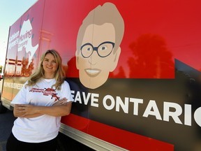 Canadian Taxpayers Federation Ontario director Christine Van Geynon arrives at Lansdowne Place mall launching a new cross Ontario tour about the Ontario affordability crisis, in the form of a moving company called the 'Kathleen Wynne Moving Company Ð Helping Businesses and Families Leave Ontario' on Tuesday October 3, 2017 in Peterborough, Ont. as the CTF launched the moving company in Richmond Hill, Ont. Tours include Brockville, Parry Sound, Sudbury, Midland, Bradford, Kitchener, Ingersoll, London, St. Thomas, Sarnia, Chatham-Kent, Windsor, Tillsonburg, Hamilton and Burlington. CLIFFORD SKARSTEDT/PETERBOROUGH EXAMINER/POSTMEDIA NETWORK