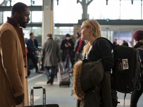 This image released by Twentieth Century Fox shows Kate Winslet, right, and Idris Elba in a scene from "The Mountain Between Us." (Kimberley French/Twentieth Century Fox via AP)
