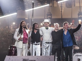 The Tragically Hip after the final show of their Man Machine Poem tour in Kingston on August 20, 2016. (CNW Group/Bell Media)