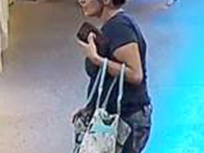 Chatham-Kent police have released an image of this female suspect wanted in connection to the theft of approximately $100 worth of items from Parks Blueberries near Bothwell, Ont. on Wednesday, September 20, 2017. (Handout)