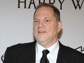 In this Feb. 10, 2016 file photo, Harvey Weinstein attends amfAR's New York Gala honoring Harvey Weinstein in New York. Weinstein is taking a leave of absence from his own company after The New York Times released a report alleging decades of sexual harassment against women, including employees and actress Ashley Judd. (Photo by Charles Sykes/Invision/AP, File)