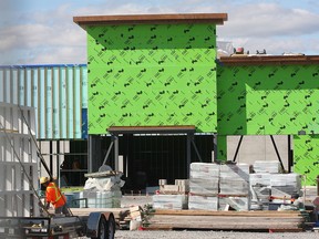 Construction continues on what is believed to be an LCBO store at the Riverview Shopping Centre on Thursday in Kingston’s east end. Some of the stores in the mall will open in November.