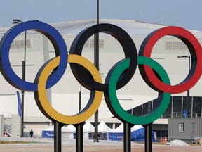 In this April 4, 2017, file photo, Olympic rings are seen in front of Gangneung Hockey Center in Gangneung, South Korea. (AP Photo/Ahn Young-joon, File)