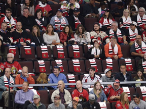 Scarves mark empty seats in the crowd as the Ottawa Senators take on the Washington Capitals in their season opener at the Canadian Tire Centre on Thursday, October 5, 2017. The building was slightly less than full for Game 1. ADRIAN WYLD / THE CANADIAN PRESS