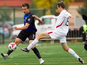 FC Edmonton midfielder Ben McKendry plays the ball past San Francisco Deltas midfielder Maxim Tissot in North American Soccer League play at Clarke Stadium on Sunday, Oct. 1, 2017.