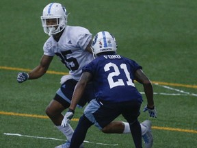Argos utility man Qudarius Ford (right)will take the field as a linebacker against the Roughriders this Saturday. (Jack Boland/Toronto Sun)