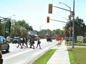 Students from Ursuline College Chatham leave school grounds at the end of the school day on Oct. 5