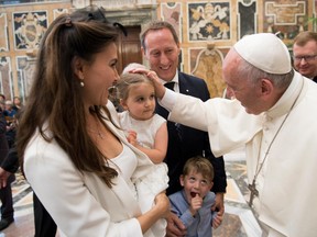 This handout picture released by the Vatican press office shows Pope Francis during a meeting with the participants to the congress Child Dignity in the Digital World on October 6, 2017 at the Vatican. (Osservatore Romano/Getty Images)