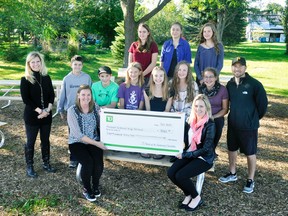 Members of the MDHS Eco-team accept the $8,062.55 donation from the TD Friends of the Environment Foundation, and Mitchell TD branch manager Linda McKay (front, right). Back row (left): Kyla Horton, Madison LeBlanc and Malia Glanville. Middle row (left): Principal Petra Goetz, David Price, Mark Knill, Cameron Larivee, Maegan Burrill, Kate Huettlin, Alley Kemp, teacher Scott Hlusiak. Sitting with McKay is last year’s Eco-team leader, teacher Michelle McDonald. ANDY BADER/MITCHELL ADVOCATE