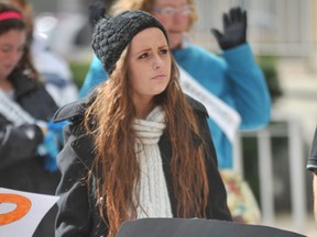 Rachel Savage, 19, was one of 150 people gathered on the steps of Sarnia city hall in 2011 to rally against poverty. This year's Stand Up Against Poverty rally is Oct. 13, starting at noon. (Observer file photo)