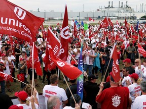 An enormous group of protesters gather in front of the Ingersoll Cami plant on Friday. (BRUCE CHESSELL/Sentinel-Review)