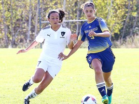 Victoria-Marie Galluzzo of the Laurentian Voyageurs women's soccer team and Vanessa Germano of the Carleton Ravens battle for the ball during OUA soccer action in Sudbury, Ont. on Sunday October 1, 2017.  Laurentian defeated Carleton 3-0. The men lost 3-1 to Carleton.Gino Donato/Sudbury Star/Postmedia Network