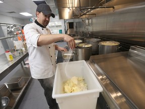 Chris Buffington prepares approximately 600 Lbs of potatoes that will be part of the Thanksgiving meal at Siloam Mission's new facility at 303 Stanley St. in Winnipeg. Friday, October 6, 2017. Chris Procaylo/Winnipeg Sun/Postmedia Network