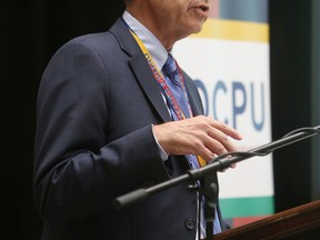 Stephen Archer of the Queen's University school of medicine speaks at the opening of the university's new cardiopulmonary unit in Kingston on Friday. (Elliot Ferguson/The Whig-Standard)