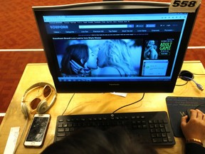 People in the Toronto libraries and elsewhere can view pornography in their computers on Friday October 6, 2017. Shown here at the Toronto Reference Library on Yonge St. (Michael Peake/Toronto Sun)