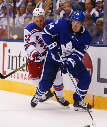 Toronto Maple Leafs�Auston Matthews C (34) looks to get past New York Rangers Kevin Shattenkirk D (22) in the first period in Toronto on Saturday October 7, 2017. Jack Boland/Toronto Sun/Postmedia Network