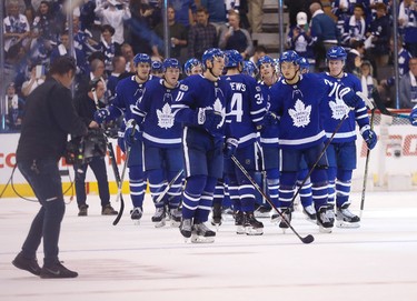 Toronto Maple Leafs celebrate an 8-5 win over the New York Rangers in the third period in Toronto on Saturday October 7, 2017. Jack Boland/Toronto Sun/Postmedia Network