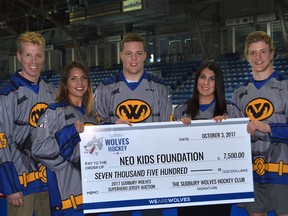 Supplied photo
From left to right are Andrew Dale, of the Sudbury Wolves, Briana Fram (NEO Kids), Reagan O’Grady, of the Wolves, Shanna Crispo ( NEO Kids) and Michael Pezzetta of the Wolves. The Sudbury Wolves announced that last season’s 2nd annual Superhero game in support of North Eastern Ontario Kids Foundation, NEO Kids, raised $7,500 for the charity. The money was raised from a silent auction of the special Batman themed jerseys that the team wore last season on the Family Day long weekend in February.