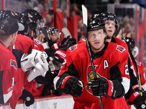 Dion Phaneuf #2 of the Ottawa Senators celebrates his third period goal against the Detroit Red Wings with teammates at the bench at Canadian Tire Centre on October 7, 2017 in Ottawa, Ontario, Canada. (Photo by Jana Chytilova/Freestyle Photography/Getty Images)