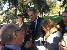 Manitoba Premier Brian Pallister tells reporters Thursday, Oct. 5, 2017, outside the Manitoba legislature in Winnipeg that he's not proposing a health care tax. TOM BRODBECK/Winnipeg Sun/Postmedia Network