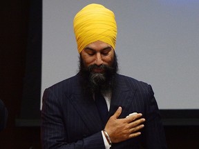 NDP Leader Jagmeet Singh reacts to applause as he arrives to his first caucus meeting since being elected to the leadership of the New Democrats, in Ottawa on Oct. 4, 2017. (Sean Kilpatrick/The Canadian Press)